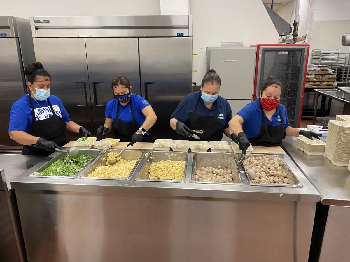 Meals on Wheels San Antonio Kitchen Crew Plating Meals